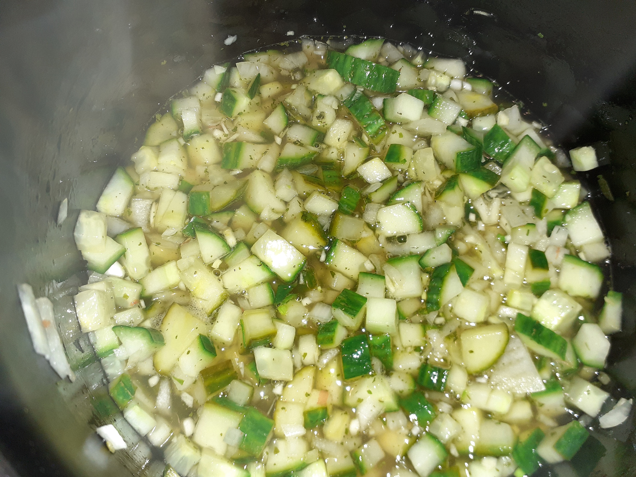 Put the cucumbers, onions, garlic and the rest of the ingredients in a pot.